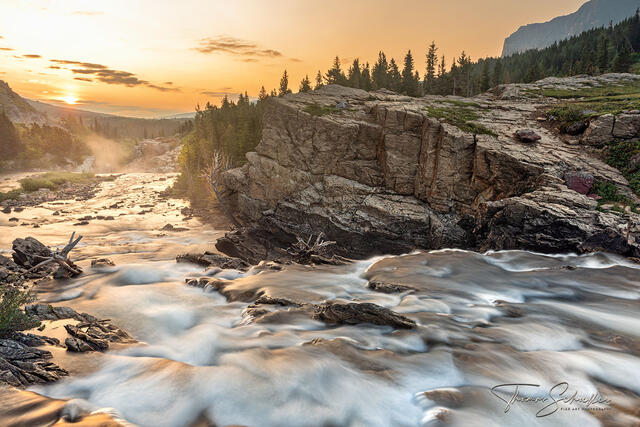 Limited Edition Fine Art Nature Glacier National Park photography Prints | Swiftcurrent Falls plunges towards the colorful sunrise