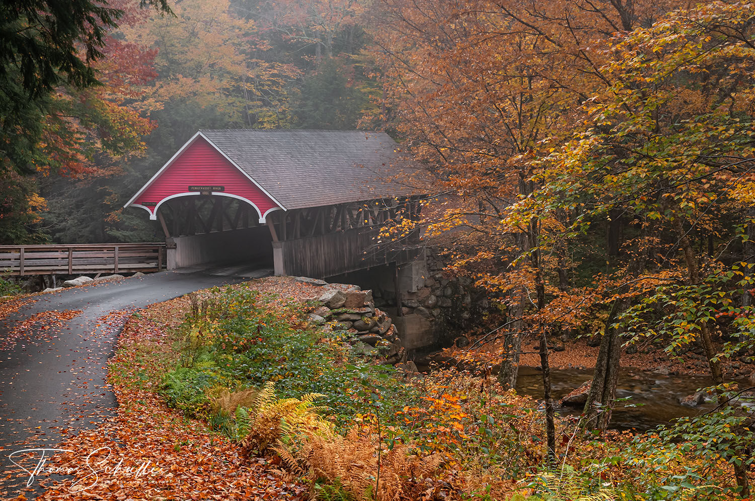 New Hampshire's rustic Flume Covered bridge is cradled in vibrant autumn foliage and ethereal mist | Quintessential New England Fine Art Prints for sale  
