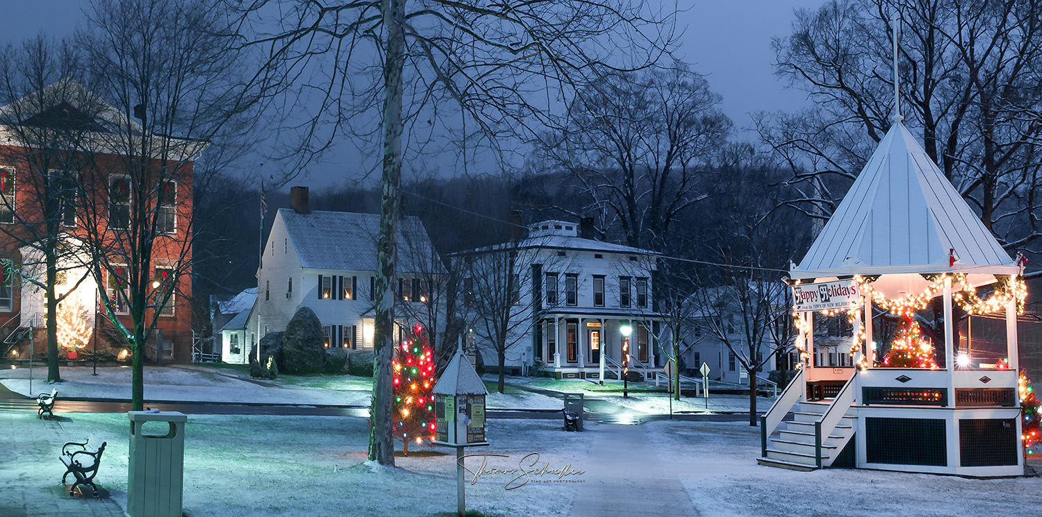 Christmas Morning in New Milford CT | A snowy festive scene from the downtown village featuring the decorated bandstand