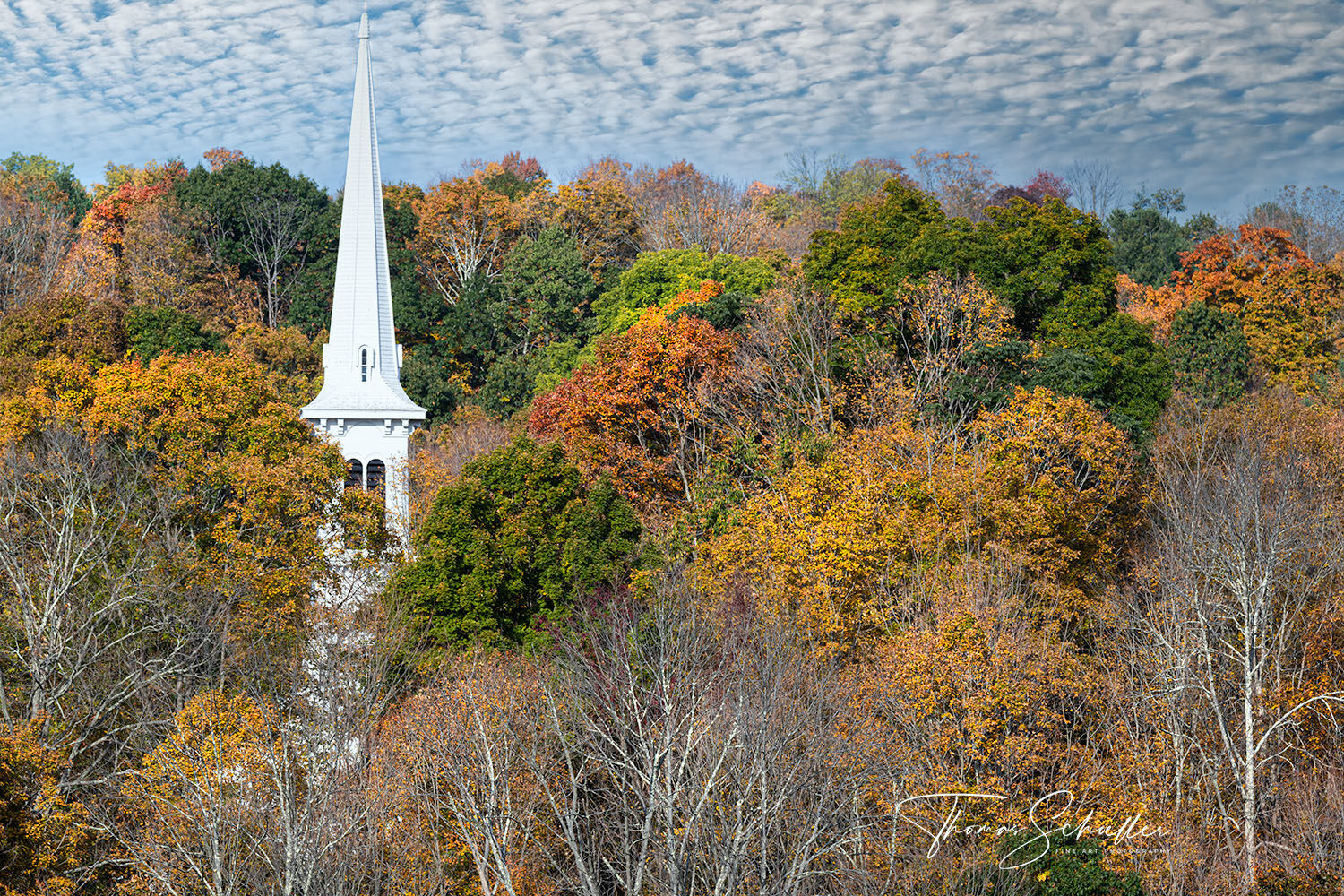 New Preston's Congregational Church steeple overlooks the brilliant fall foliage from its hillside perch | Litchfield Hills scenic landscapes photography