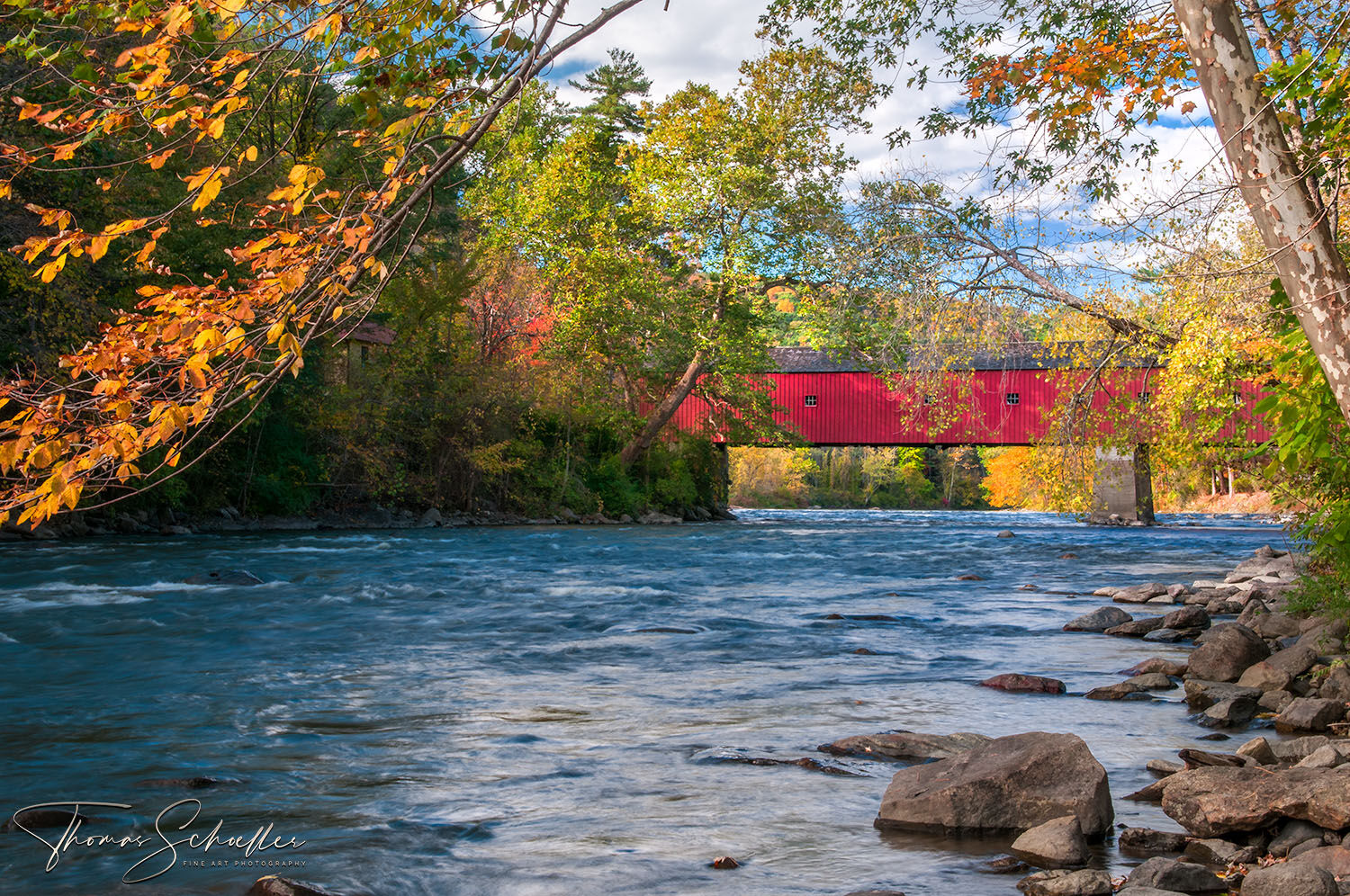Idyllic New England scene featuring the vintage red covered bridge in West Cornwall Ct | Litchfield Hills Connecticut photography by Thom Schoeller